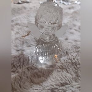 A bag of Ornaments and Clear Angel and Vintage Soldiers Head